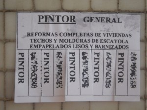 cartel de un anuncio de un pintor en Alicante.